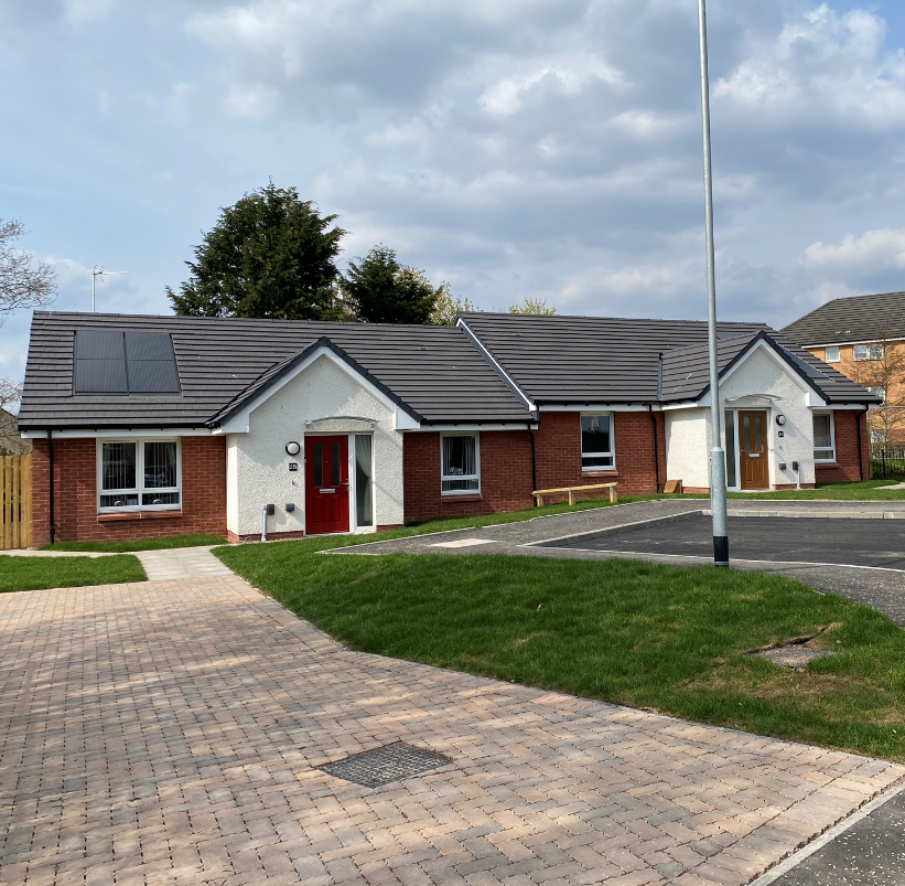 Completion photo of two bungalows at Caledonian Avenue, Bellshill 