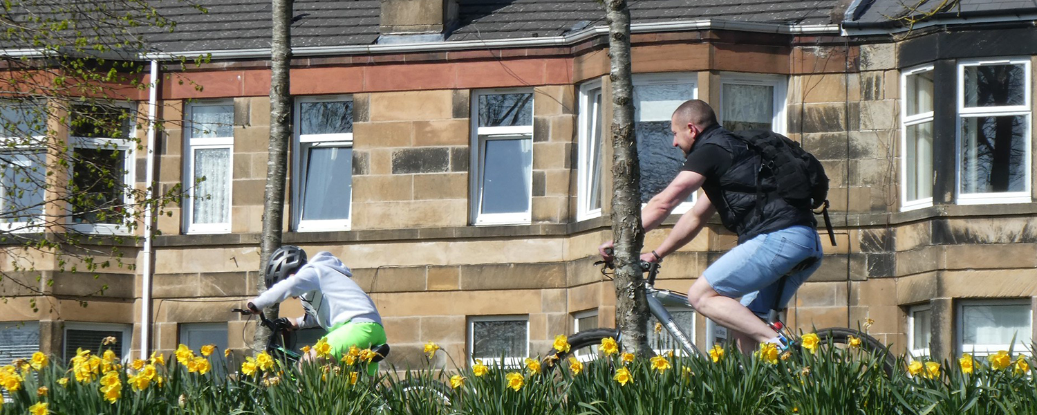 Man and child cycling