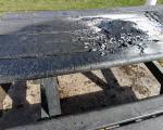 damaged picnic table in country park