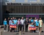 A large group of people standing outside Ravenscraig Regional Sports Facility