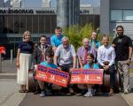 A group of people outside Ravenscraig Regional Sports Facility.
