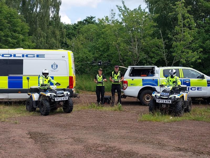 Police Scotland Quad Bike Division and Police Van in local park