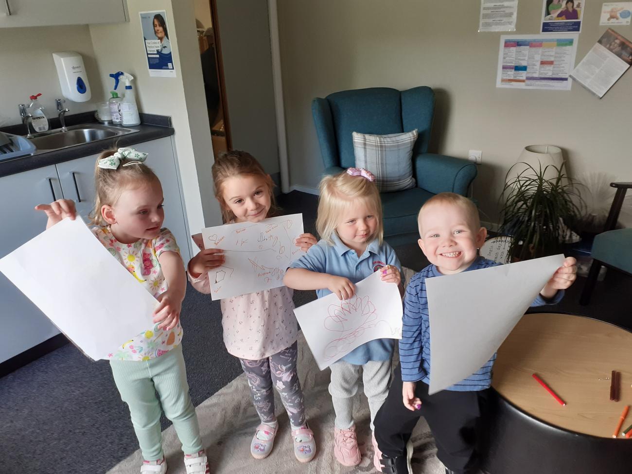 4 Children Showing off their creative ideas