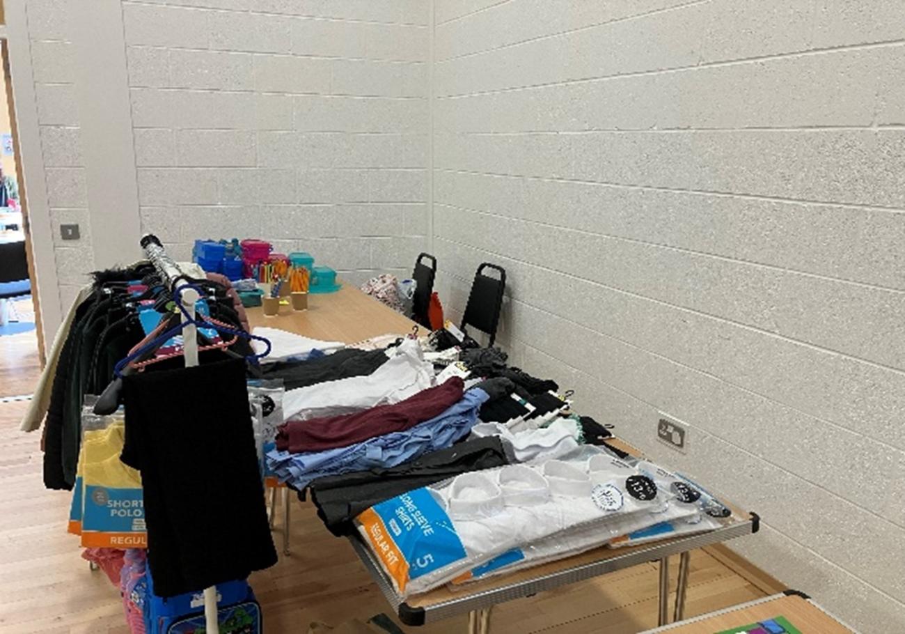 Selection of clothing on top of table
