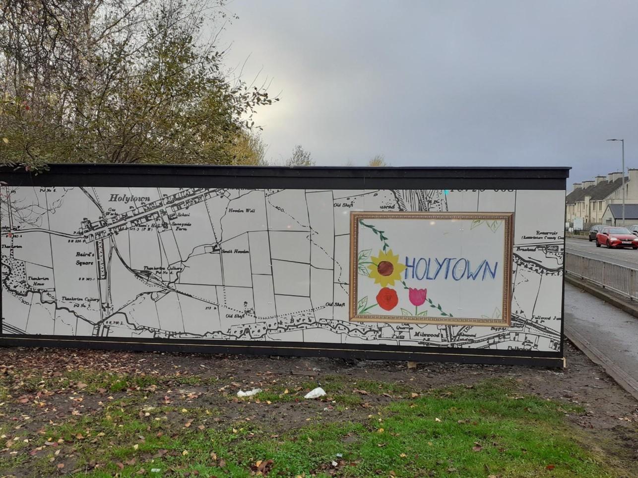 Holytown Welcome sign designed by local school pupil