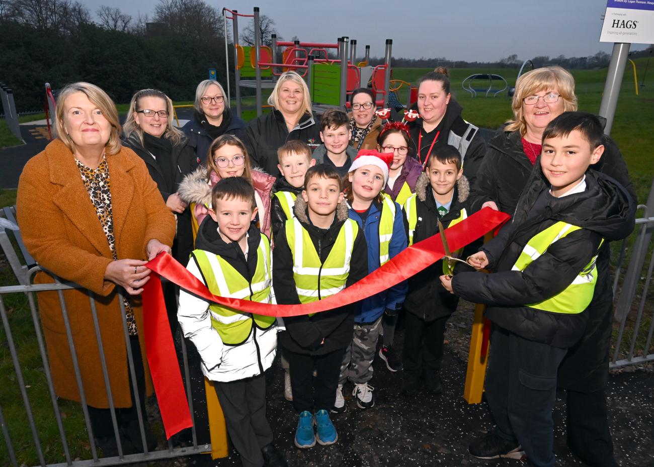 Children and officials opening play park 