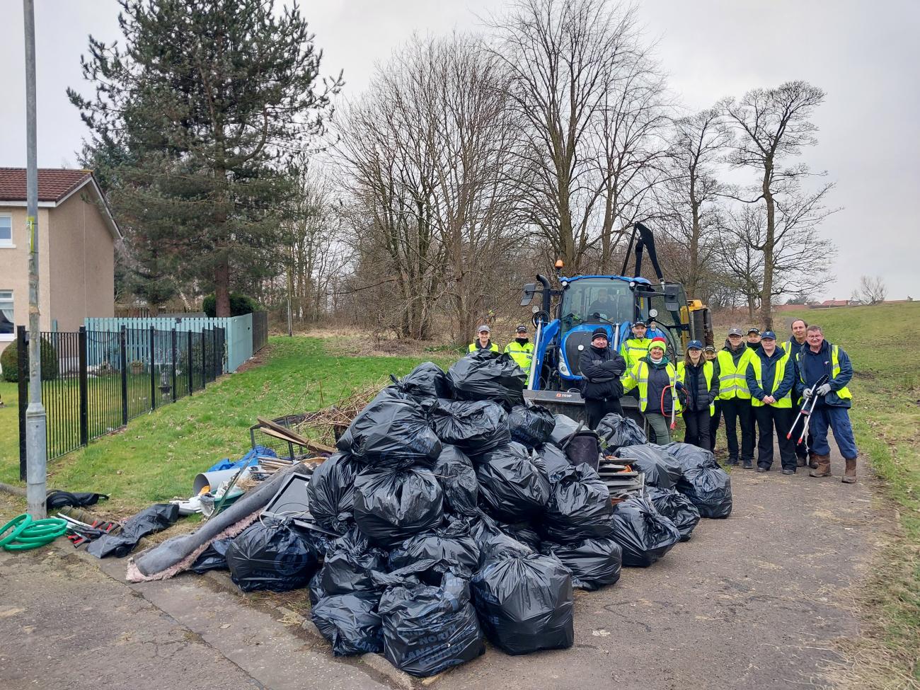 A gathering of bin bags of collected waste