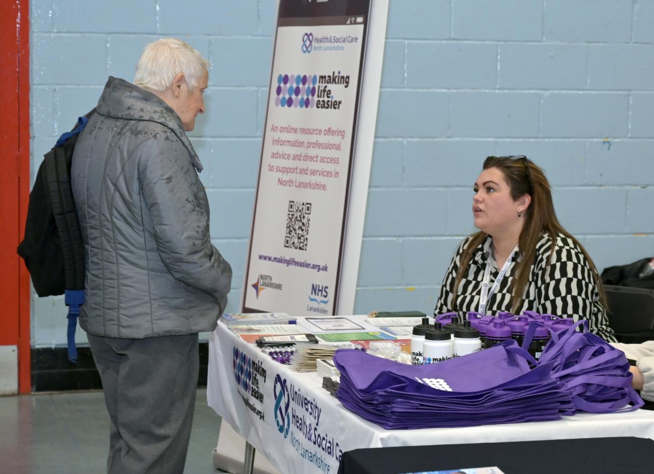 Community engagement at a information stall. 