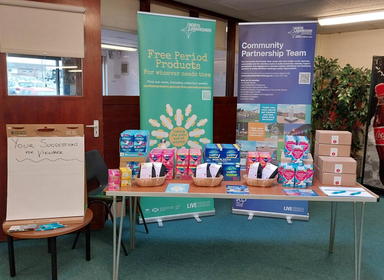 Image of community partnership team stand.
