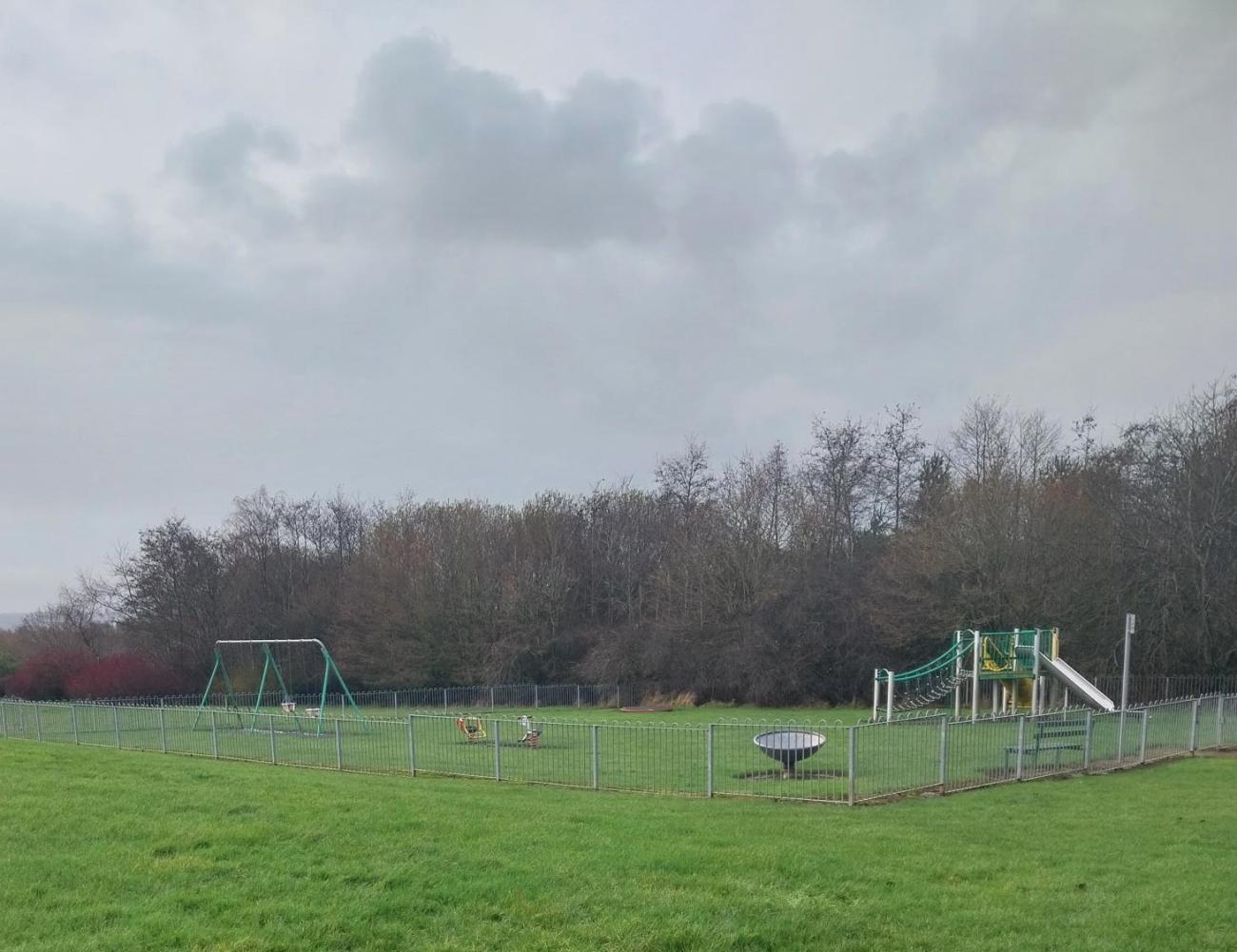 Open grass area. Proposed site for play park 