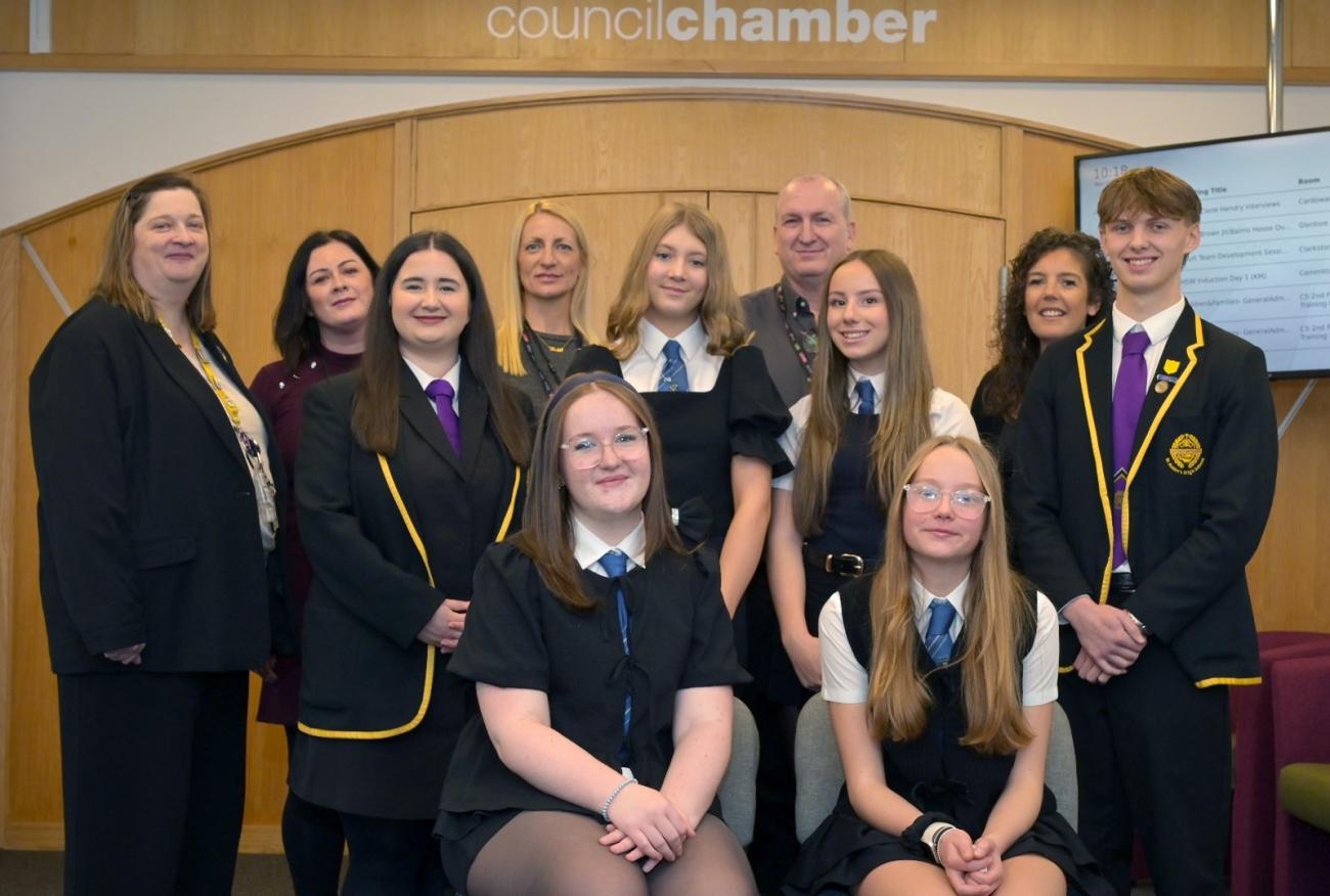 Students and Community Partnership Officers Standing outside Council Chambers