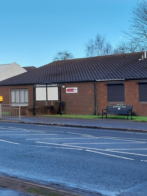 Refurbished noticeboard in front of the Craigneuk Life Long Learning, image also showcases the breathing spaces bench