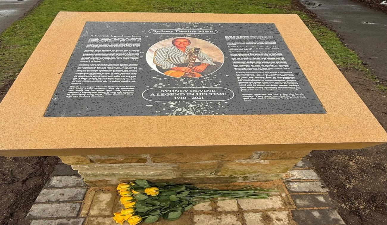 Close up image of Sydney Devines Memorial Plaque 