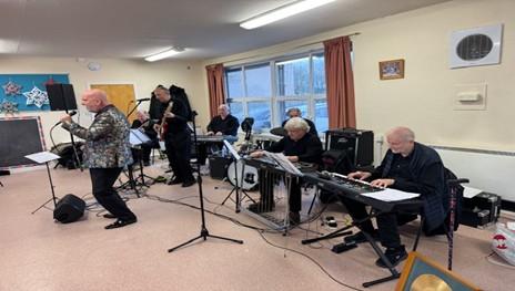 Sydney Devines band members performing