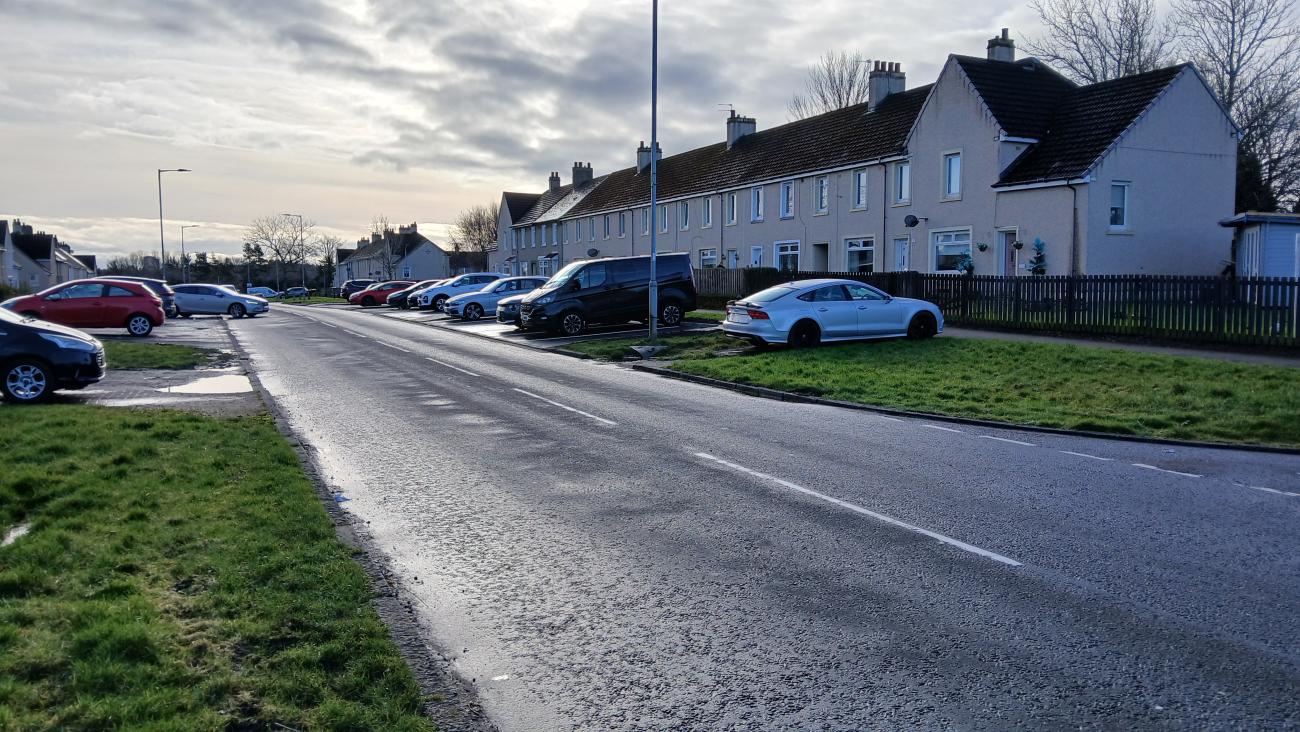 Grass divide has been reduced to allow for road to be widened for traffic safety