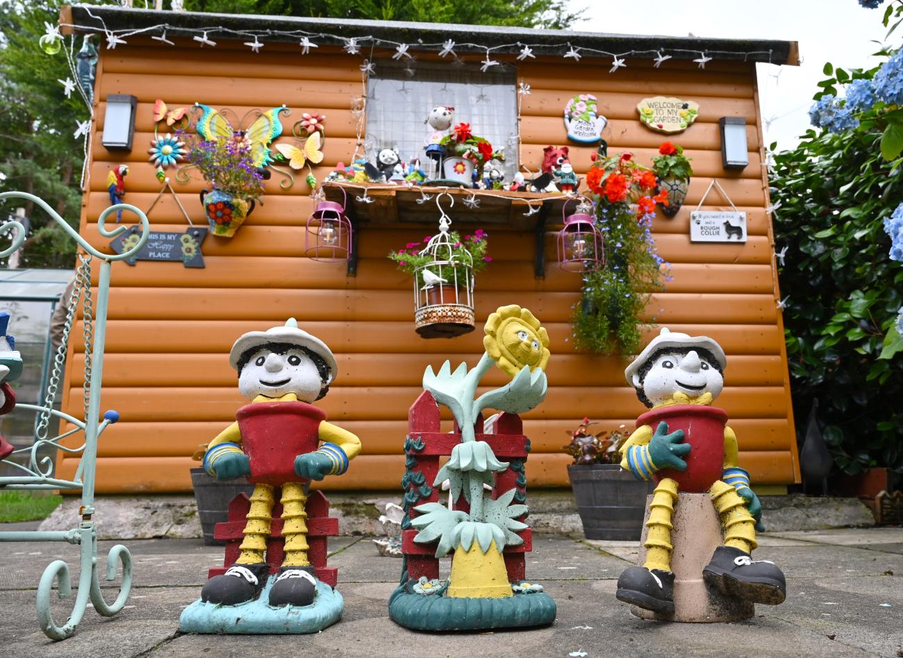 Shed with garden ornaments
