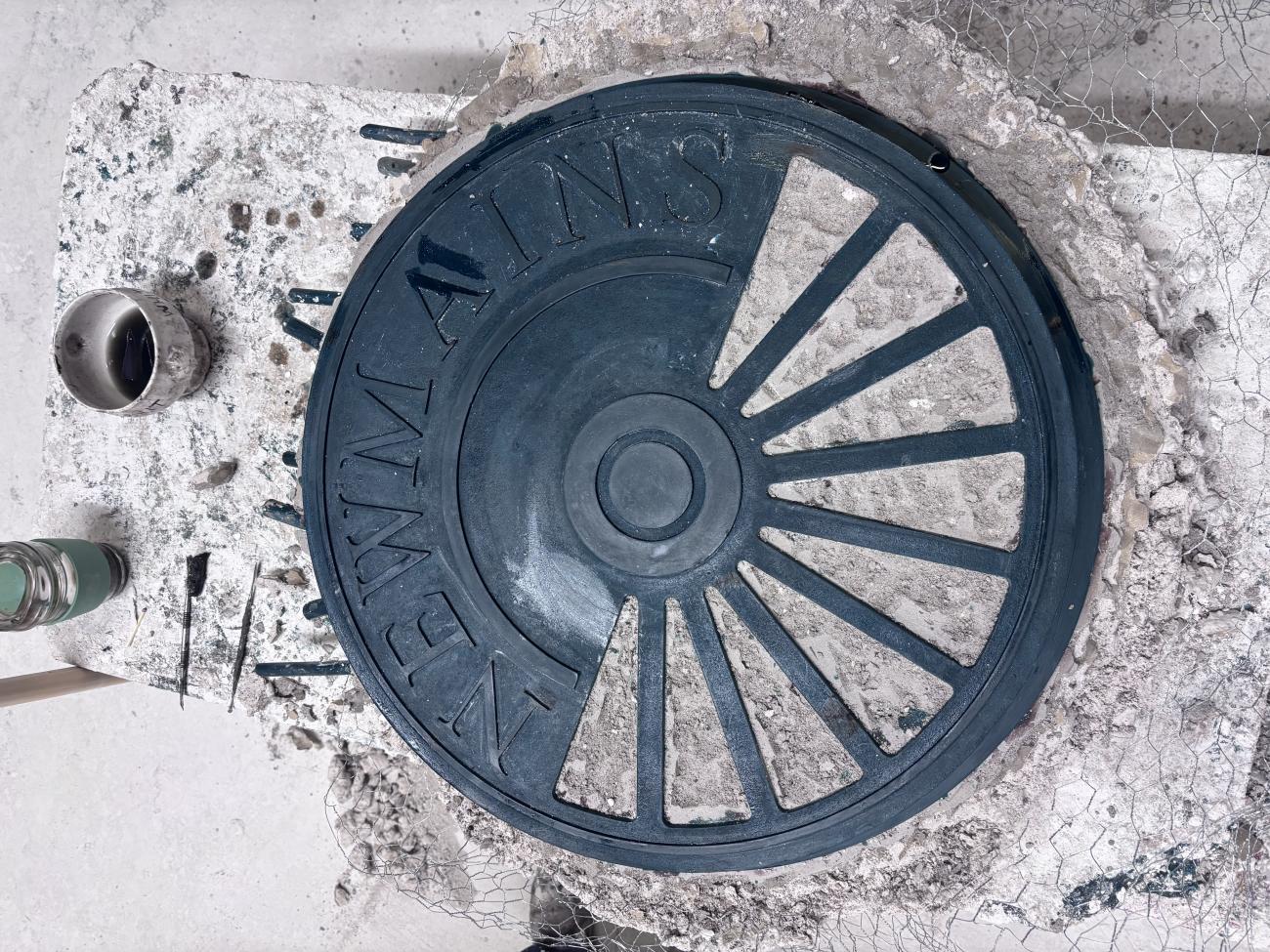 Top down view of the wheel with Newmains inscribed. 