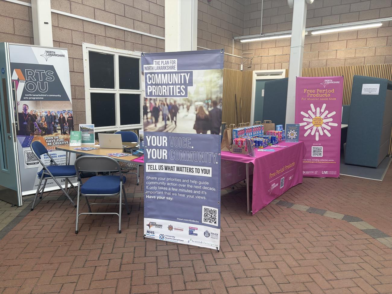 tables with pop up banner and leaflets