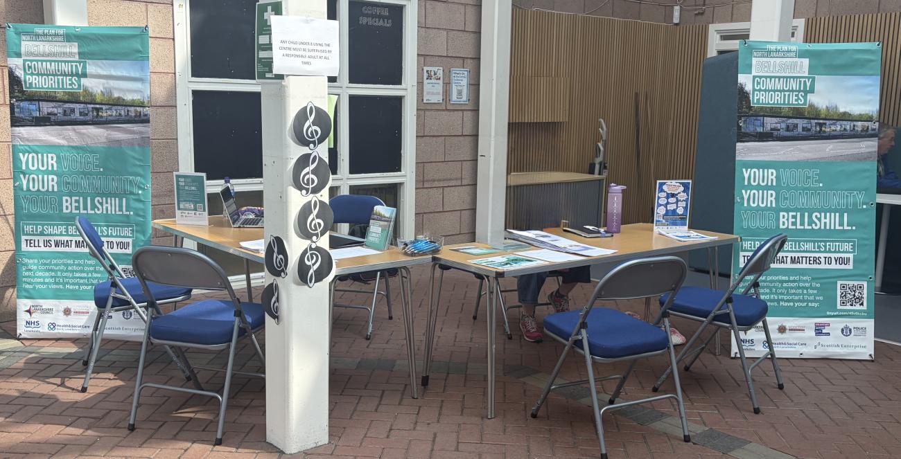 tables and pop up banners and chairs