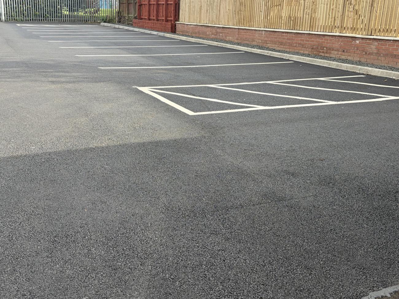 new surface on ground with lines for parking